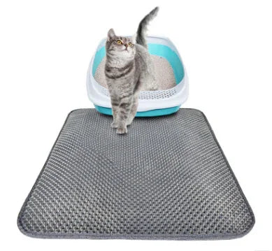 Tapete higiênico antiderrapante cinza para banheiro de gato com gato sobre o tapete
